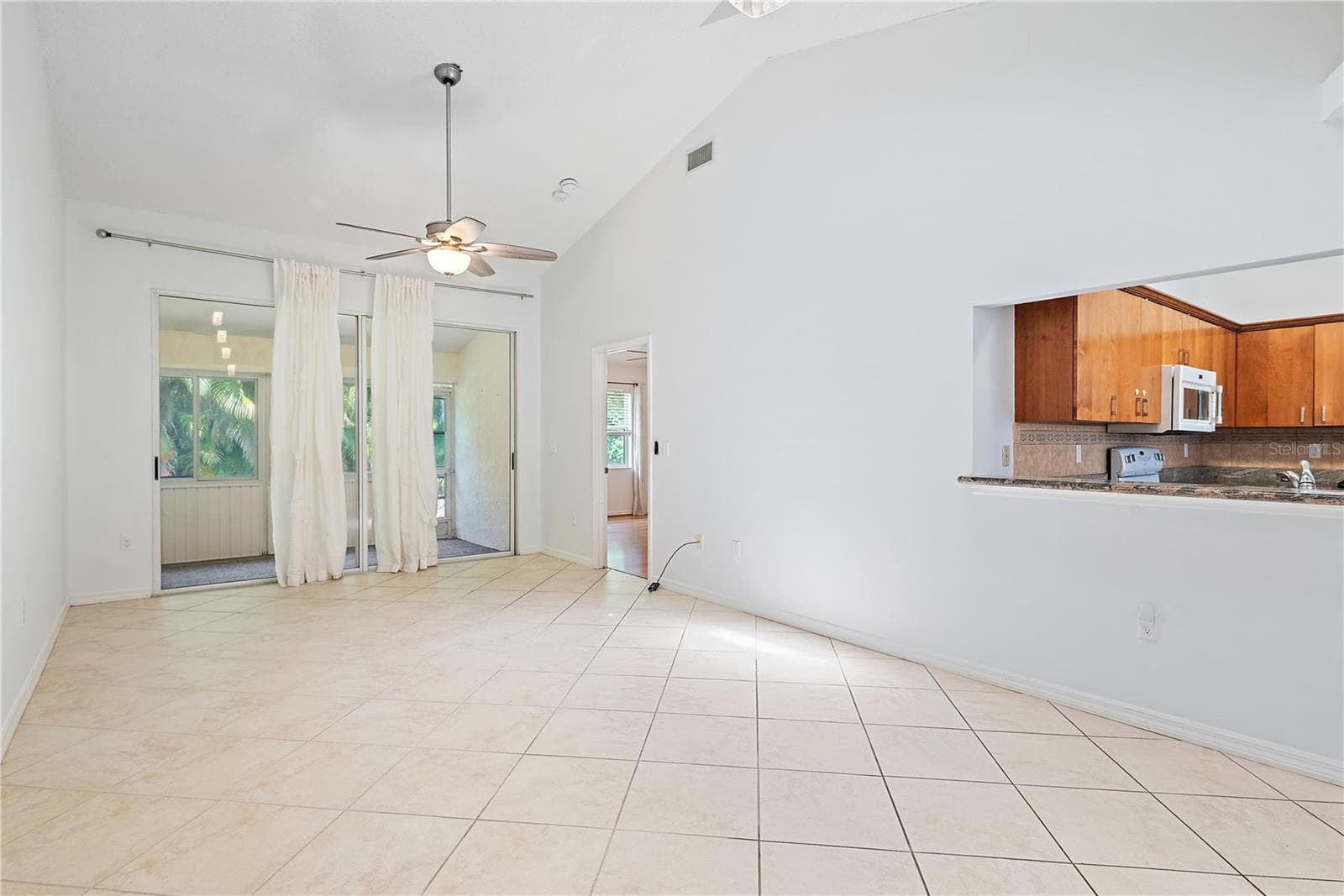 Open style Living-cum dining room - 5647 MONTE ROSSO RD, SARASOTA