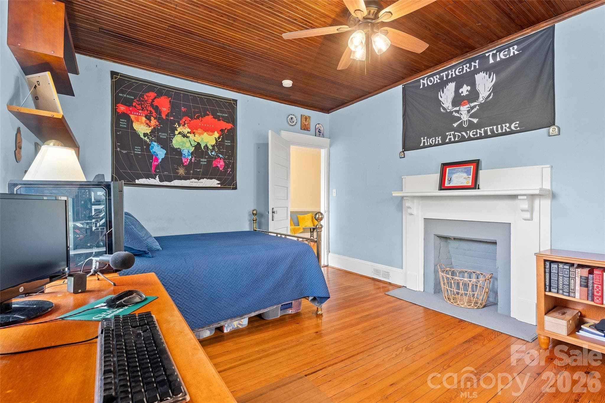 Second floor bedrooms are spacious with hardwood floors, wood bead board ceilings, fireplaces and closets. Bedroom 3 of 5 - 602 N Main Street, Davidson