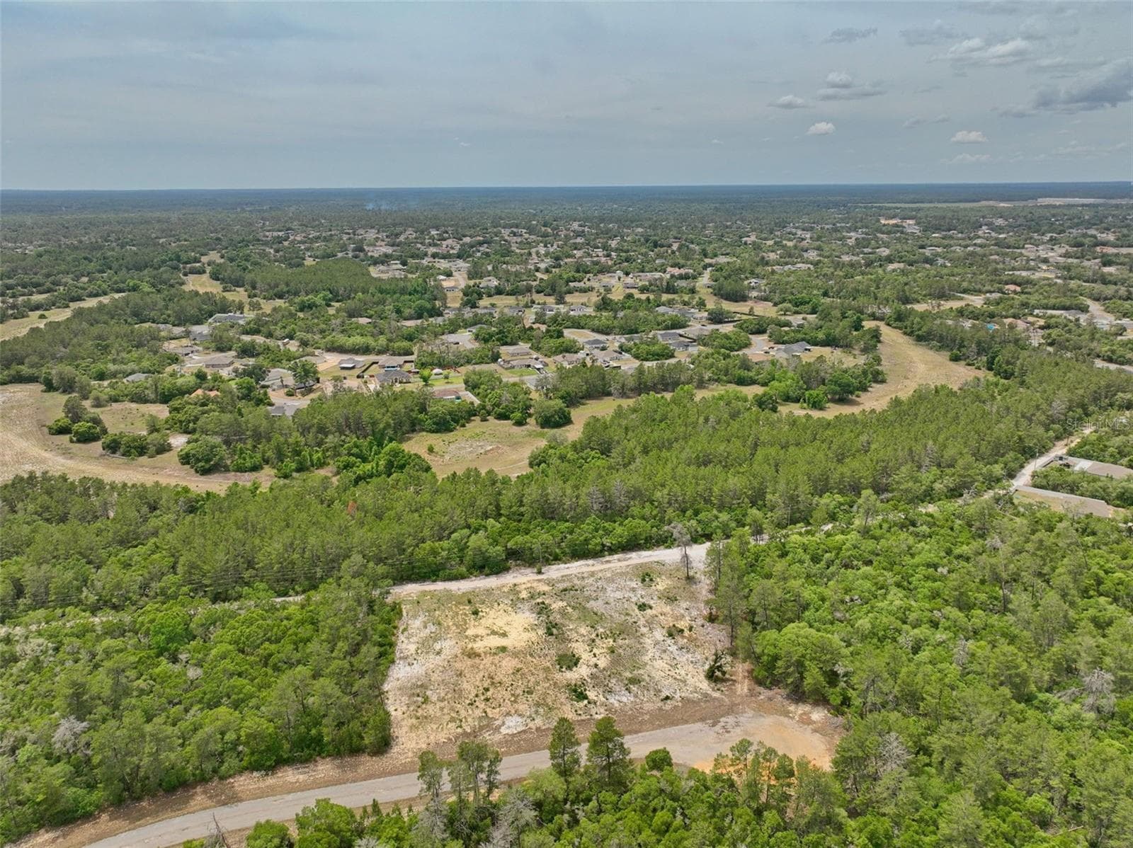 Overall view of subject property and surrounding area facing west - SW 35TH TER, OCALA