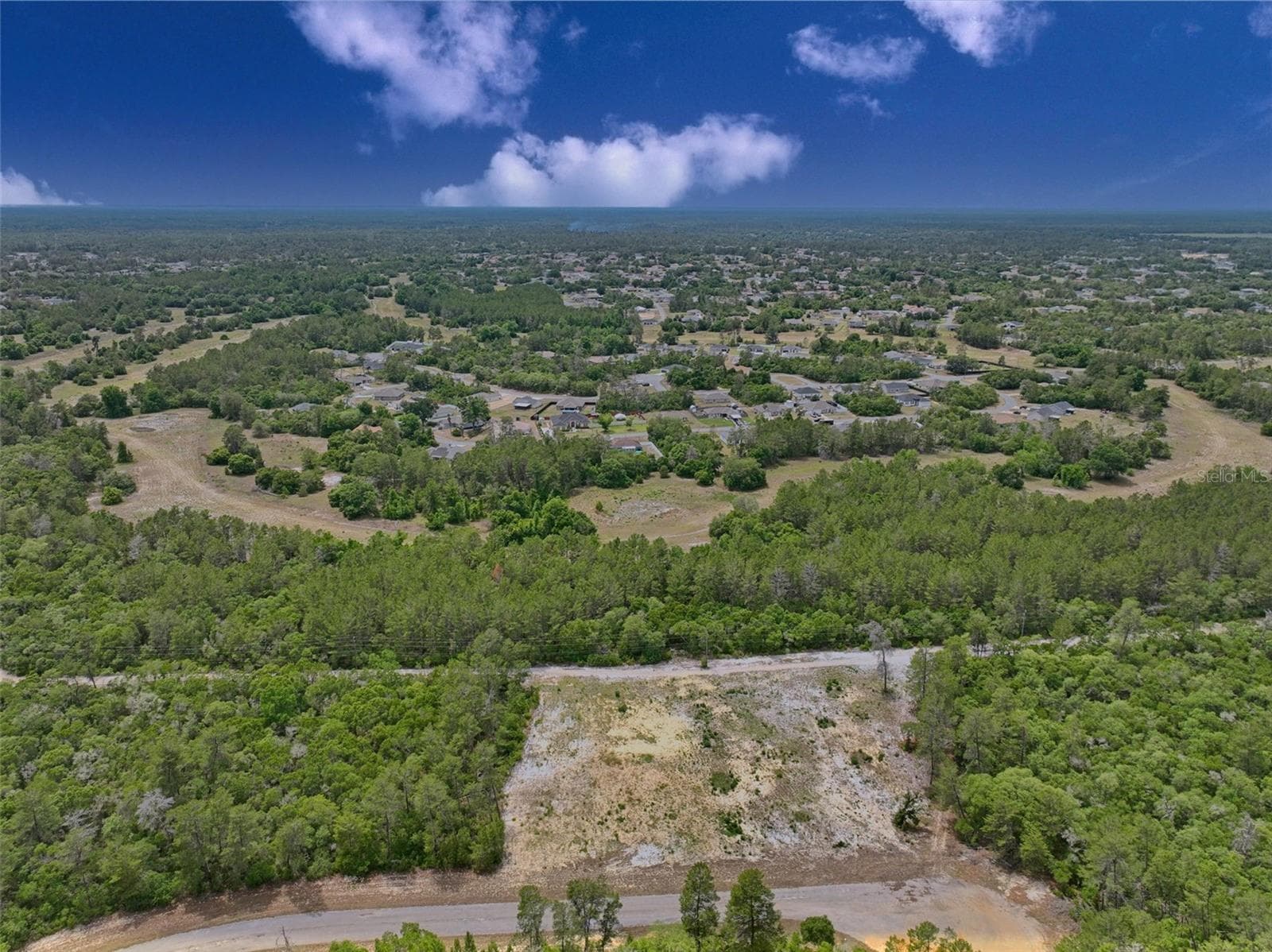 Overall view of subject property and surrounding area facing west - SW 35TH TER, OCALA