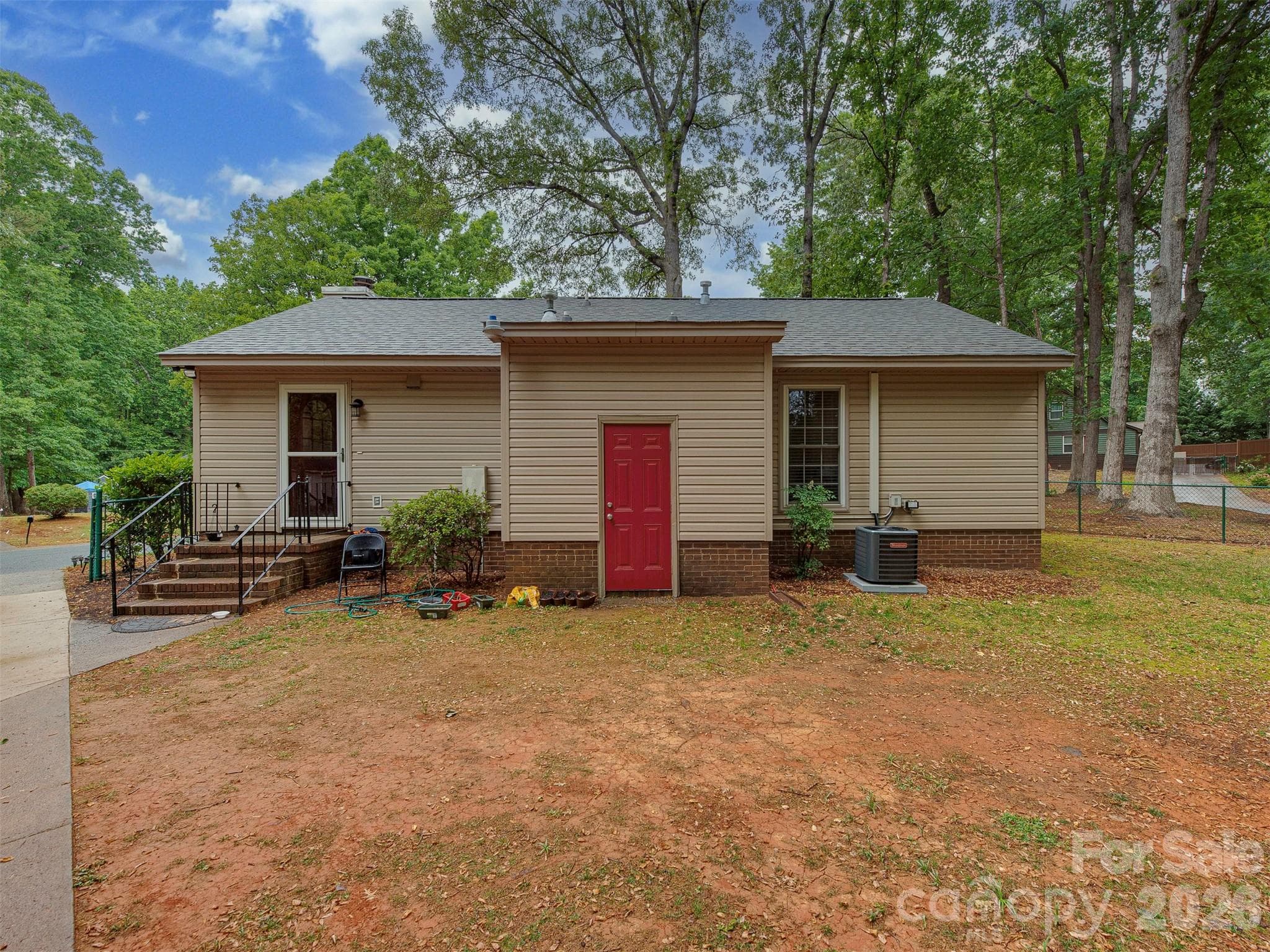 View of Back of House with Sorage area. - 10200 Cairnsmore Place, Mint Hill