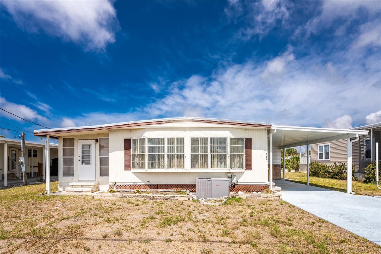 New metal roofover in 2026! - 1380 SEAGULL DR, ENGLEWOOD