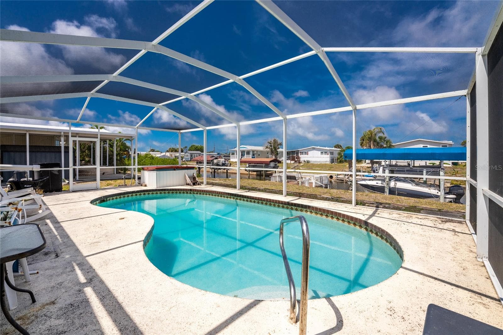Swim a few laps or just float around, enjoying the sunshine! - 1380 SEAGULL DR, ENGLEWOOD