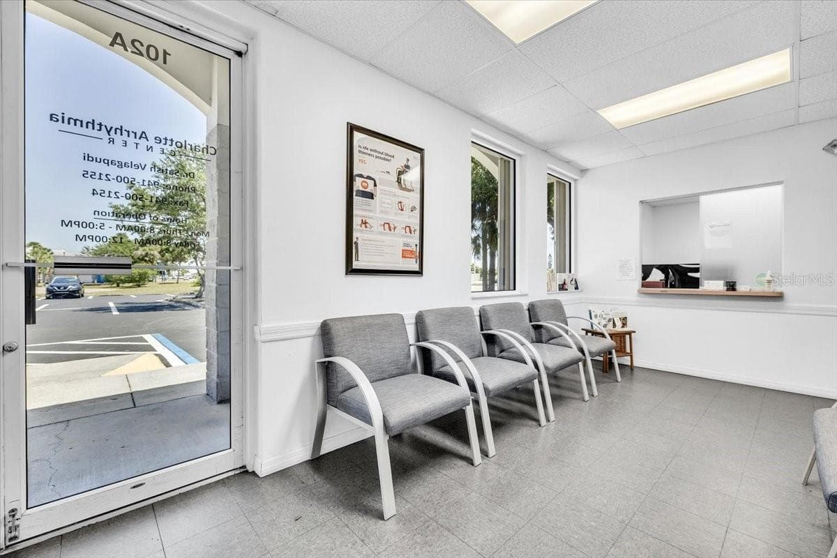 SUITE 102A Waiting Room with Reception in the background. - 3300 TAMIAMI TRL #2, PORT CHARLOTTE