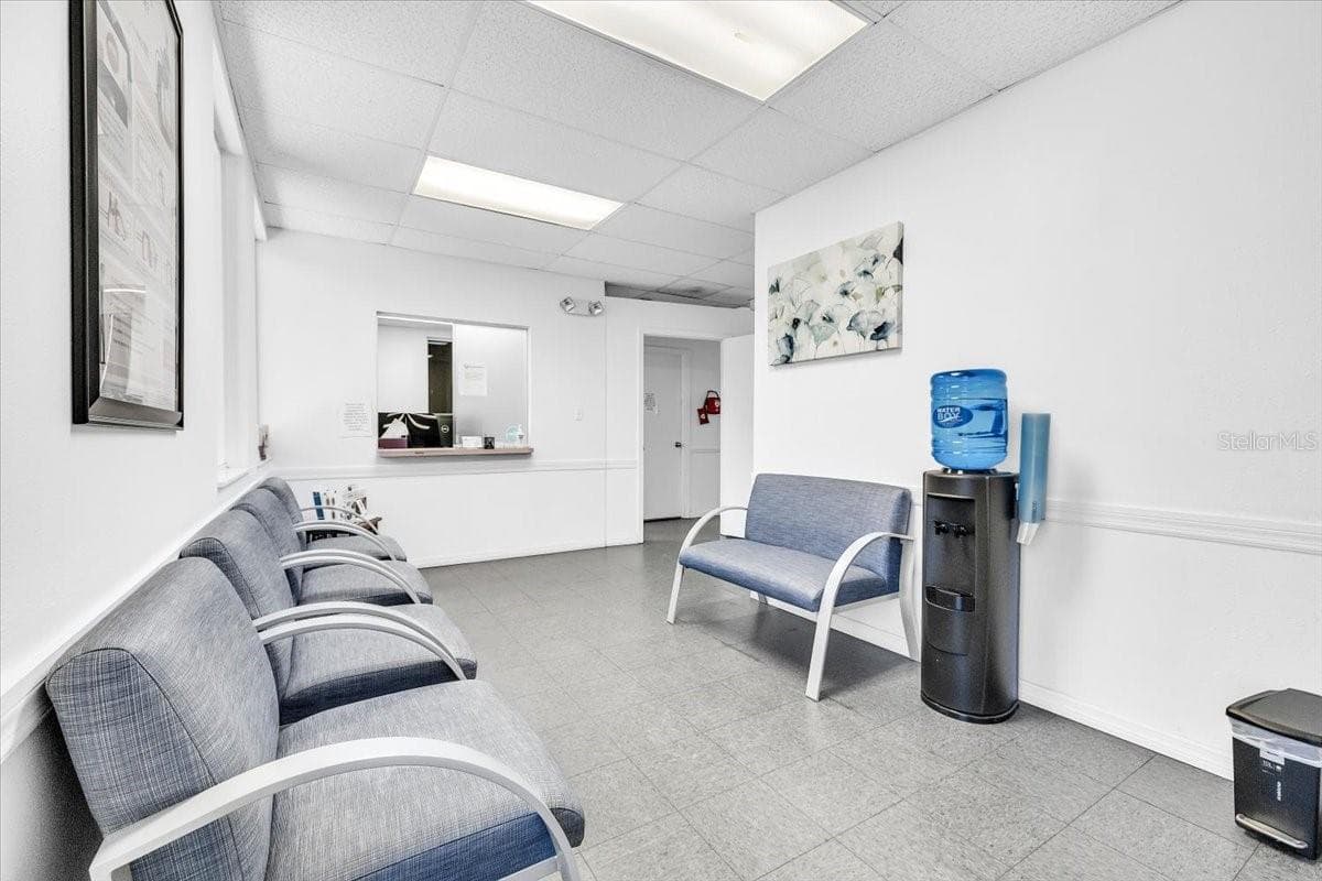 SUITE 102A Waiting Room with Reception in the background. - 3300 TAMIAMI TRL #2, PORT CHARLOTTE