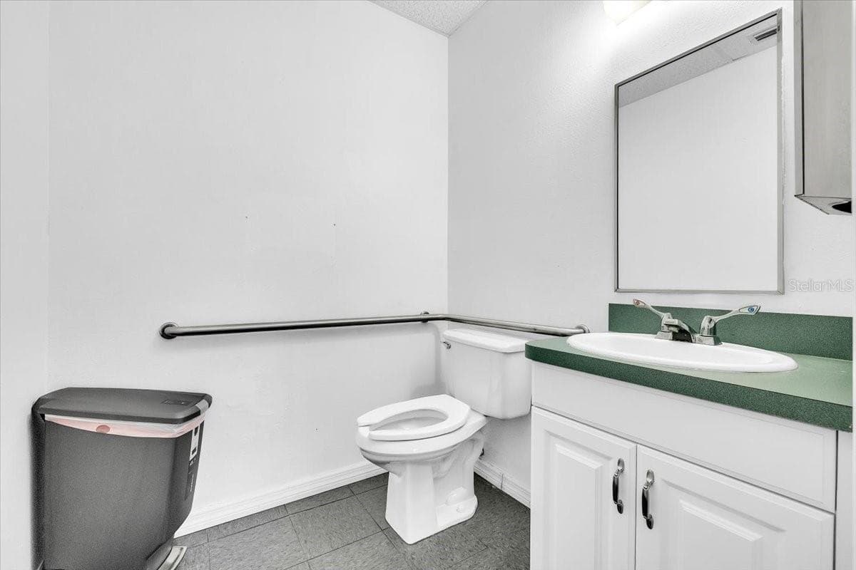 SUITE 102A Waiting Room Bath - 3300 TAMIAMI TRL #2, PORT CHARLOTTE