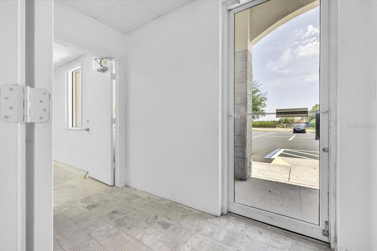 SUITE 102B Entrance into Foyer - 3300 TAMIAMI TRL #2, PORT CHARLOTTE