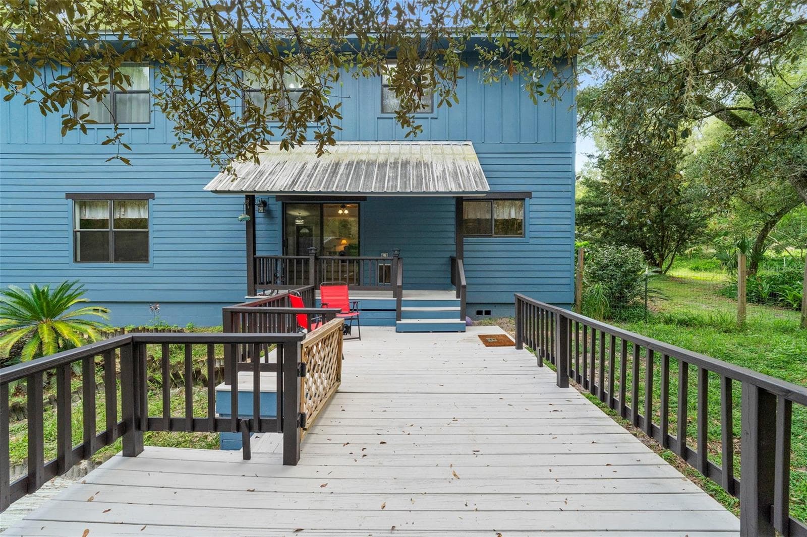 Exterior rear patio leading to pool - 1268 MCGREGOR RD, DELAND