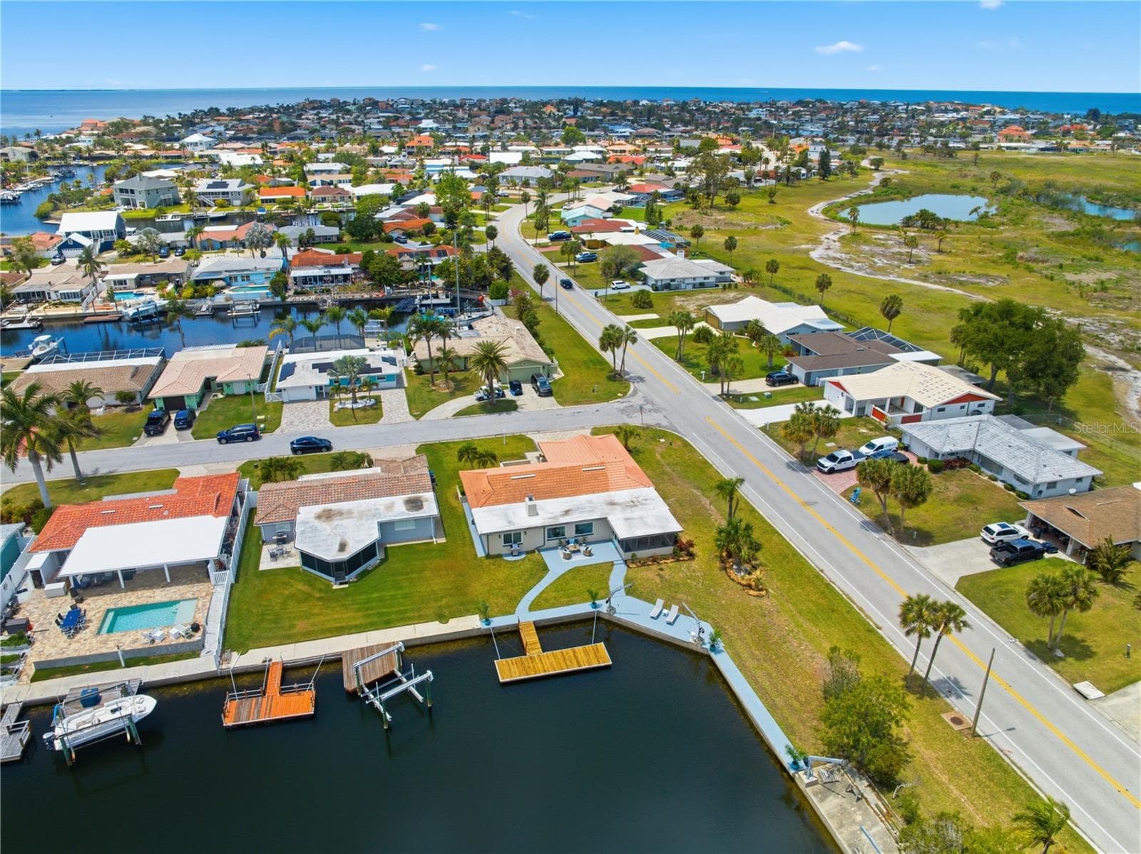 wide canal corner - 5016 DORY DR, NEW PORT RICHEY