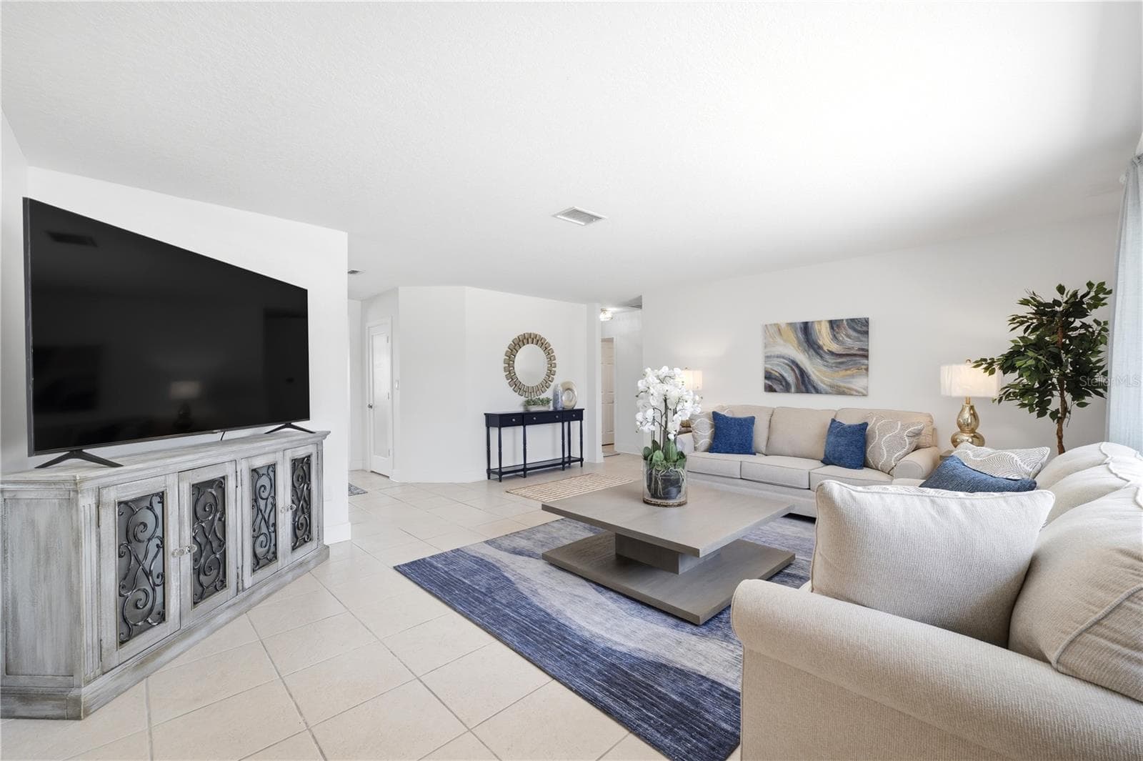open concept formal living space as you walk in - 5016 DORY DR, NEW PORT RICHEY