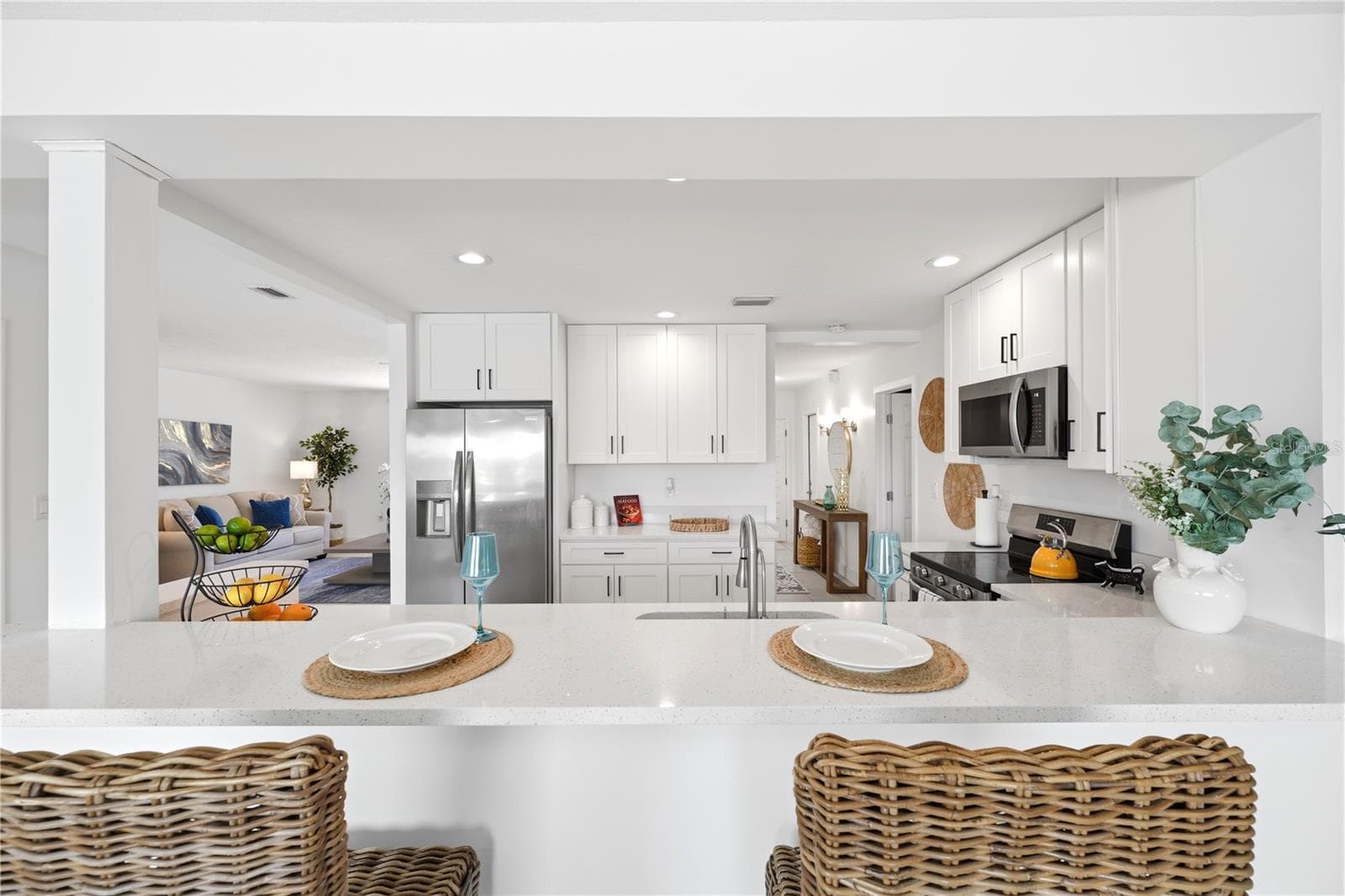 view from the snack bar into the kitchen - 5016 DORY DR, NEW PORT RICHEY