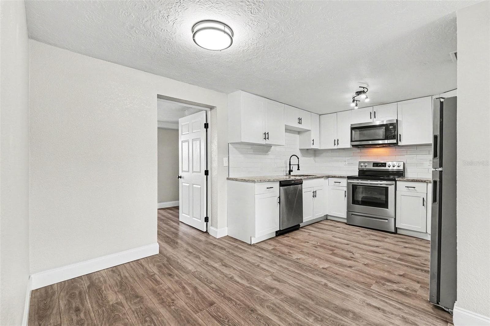 Single Family Residence at 4113 KIBLER LN, HOLIDAY, photo 9 of 22