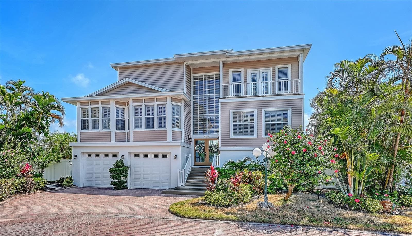Private island living is the name of the game at this unique five-residence enclave with lushly maintained landscaping. - 3040 GULF OF MEXICO DR #3, LONGBOAT KEY