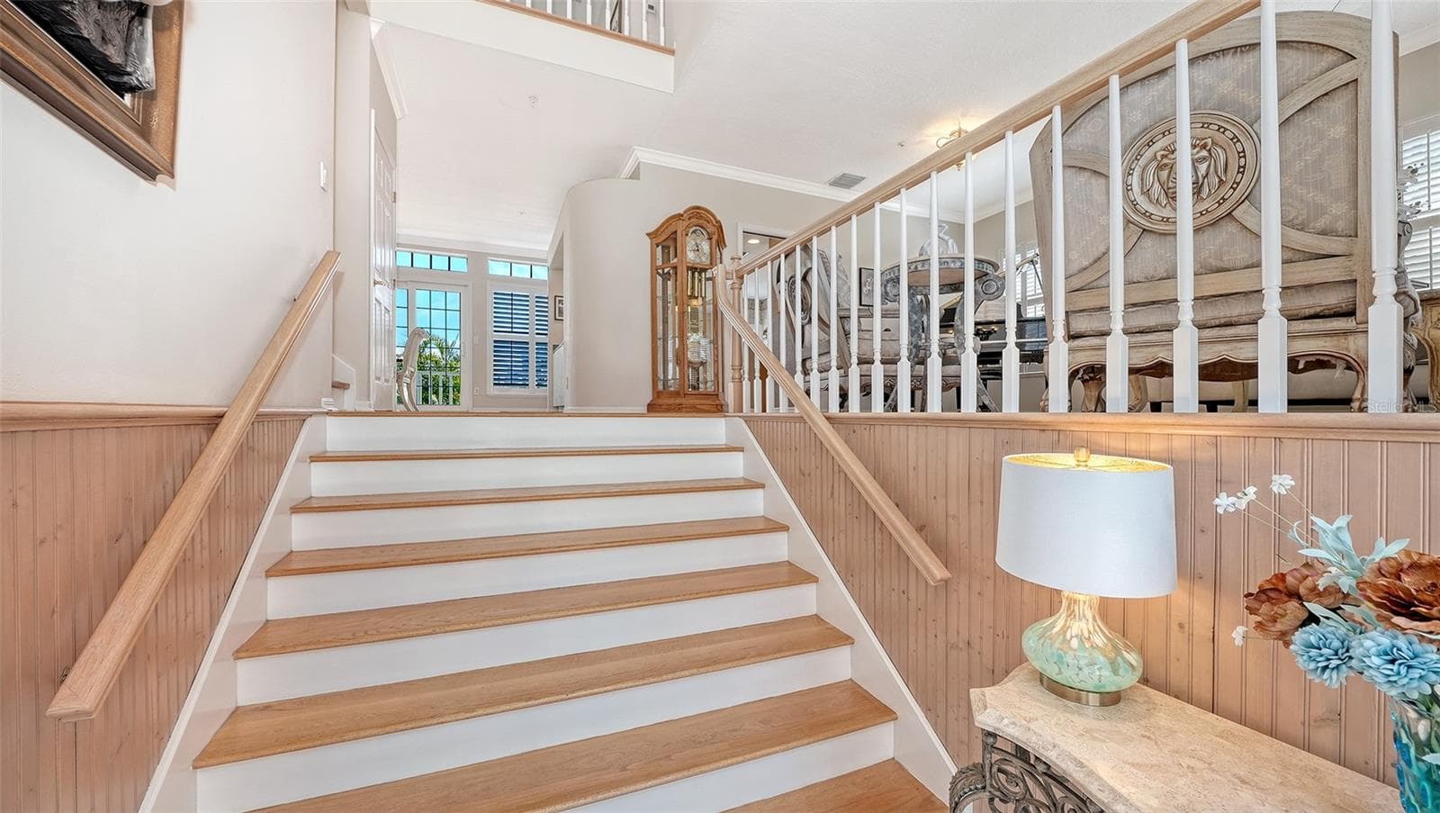 Main living area features engineered wood flooring, with new carpeting in all bedrooms and tiled baths. - 3040 GULF OF MEXICO DR #3, LONGBOAT KEY