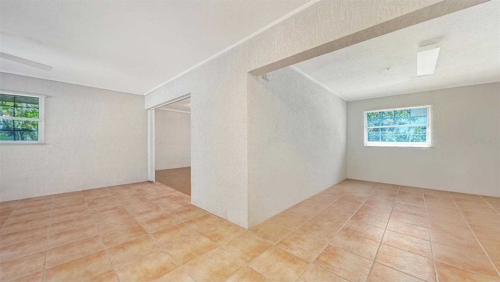 Spacious 1st level off the garage features tons of storage, perfect for fitness center, yoga, or beach toys, kayaks, bikes, etc. - 3040 GULF OF MEXICO DR #3, LONGBOAT KEY