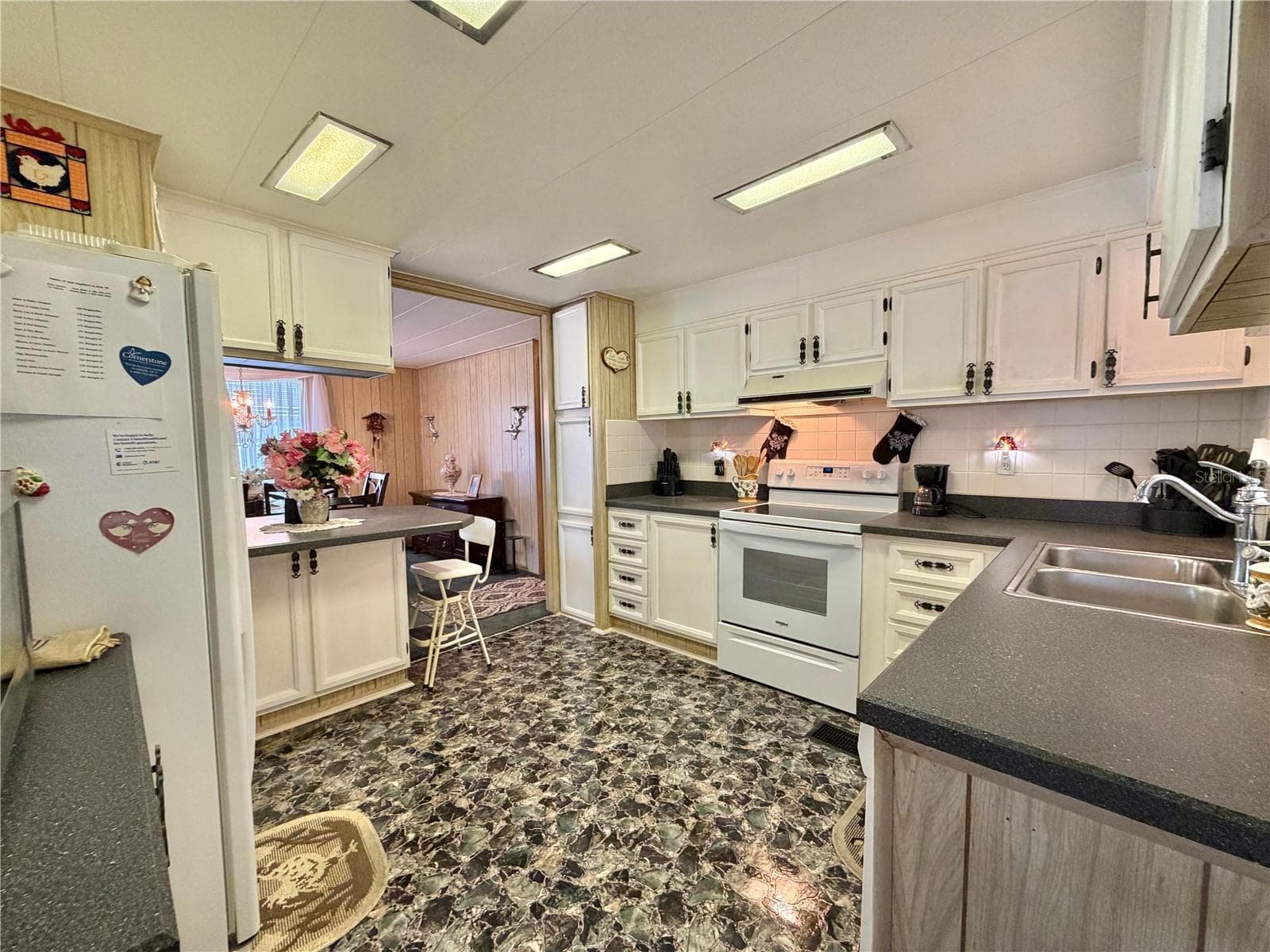 Manufactured Home at 100 MARIGOLD ST, LEESBURG, photo 5 of 67