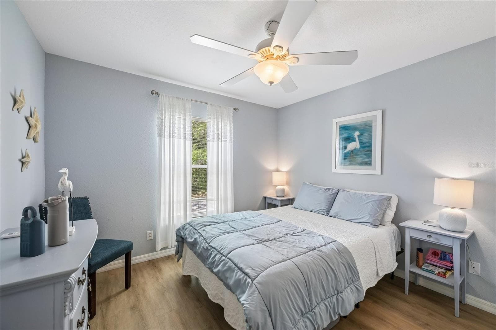 GUEST BEDROOM WITH WINDOW OVERLOOKING THE FRONT - 1003 FAIRWAYCOVE LN #201, BRADENTON