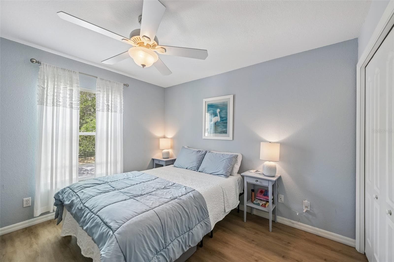 GUEST BEDROOM WITH CEILING FAN - 1003 FAIRWAYCOVE LN #201, BRADENTON