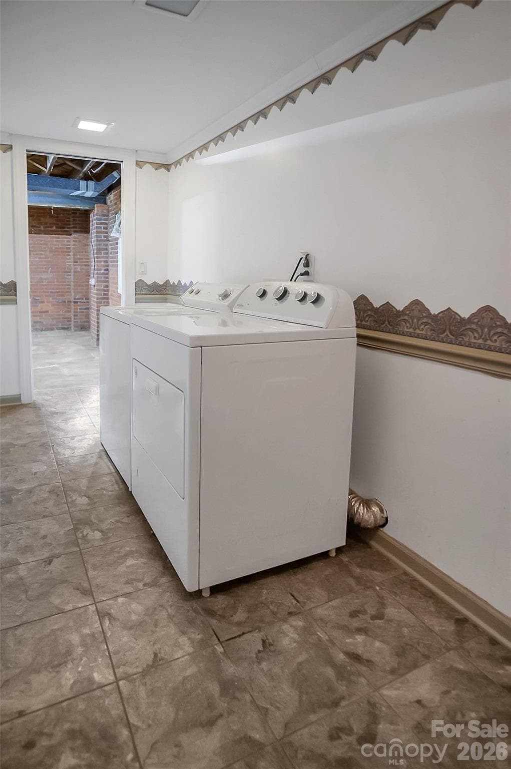 Laundry in basement. Washer and dryer may remain with home! - 3021 Davis Park Road, Gastonia