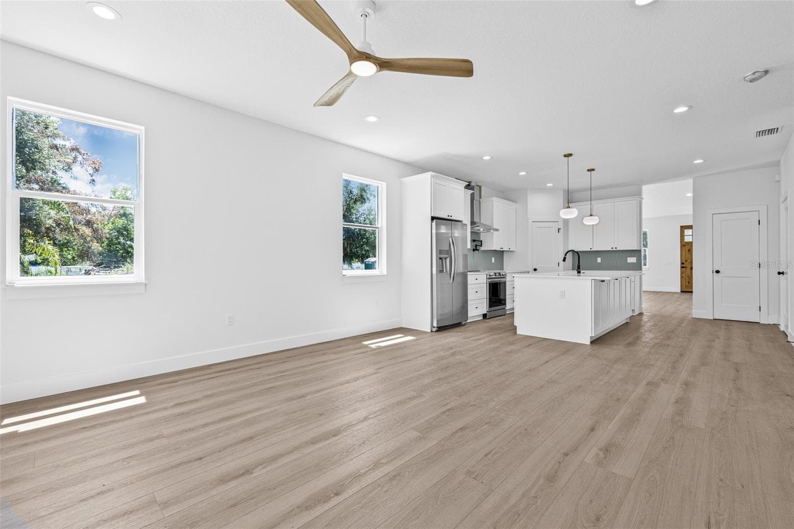 Living Room off of Kitchen - 7617 ALVINA ST, TAMPA