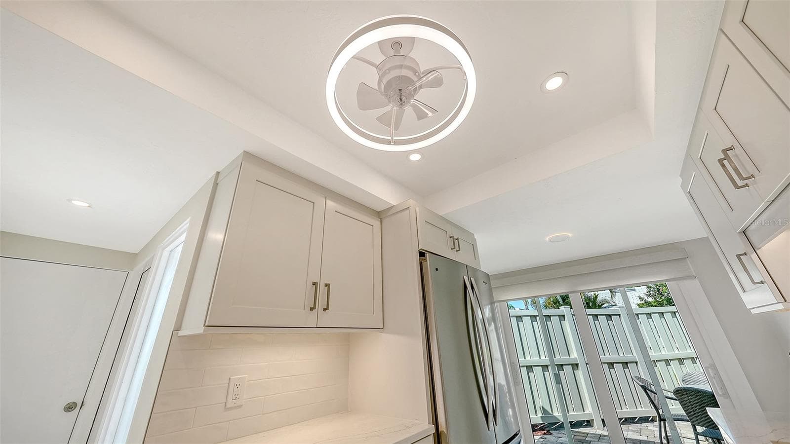 Recessed lighting and new fandelier in kitchen. - 206 HOURGLASS WAY #V10, SARASOTA