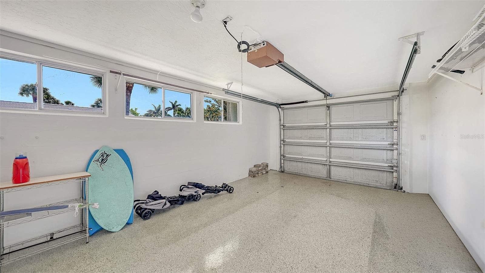 Newly cleaned and painted 1 car garage with epoxy floor. - 206 HOURGLASS WAY #V10, SARASOTA