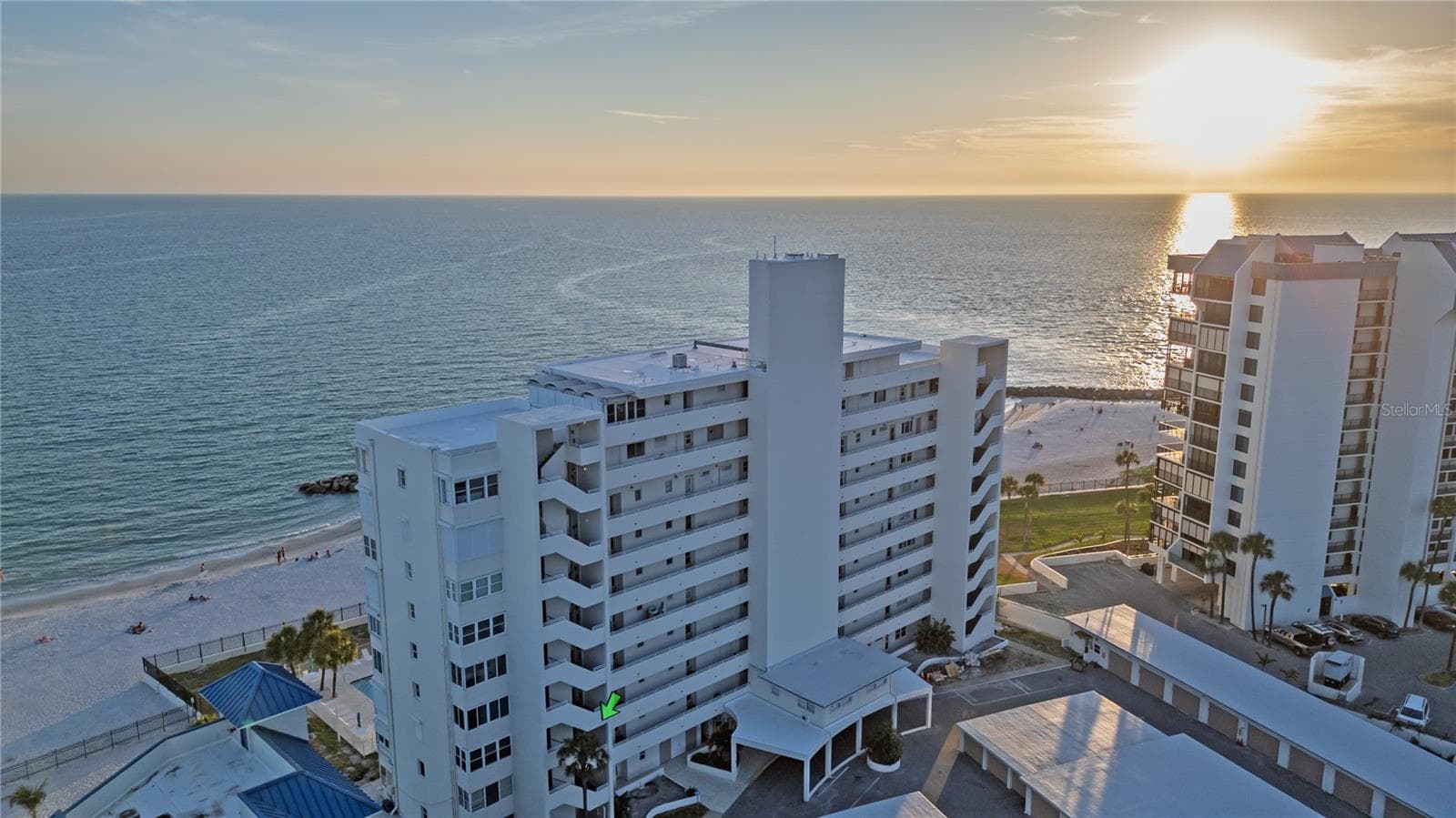 Sunset Front of building - 7000 BEACH PLZ #202, ST PETE BEACH