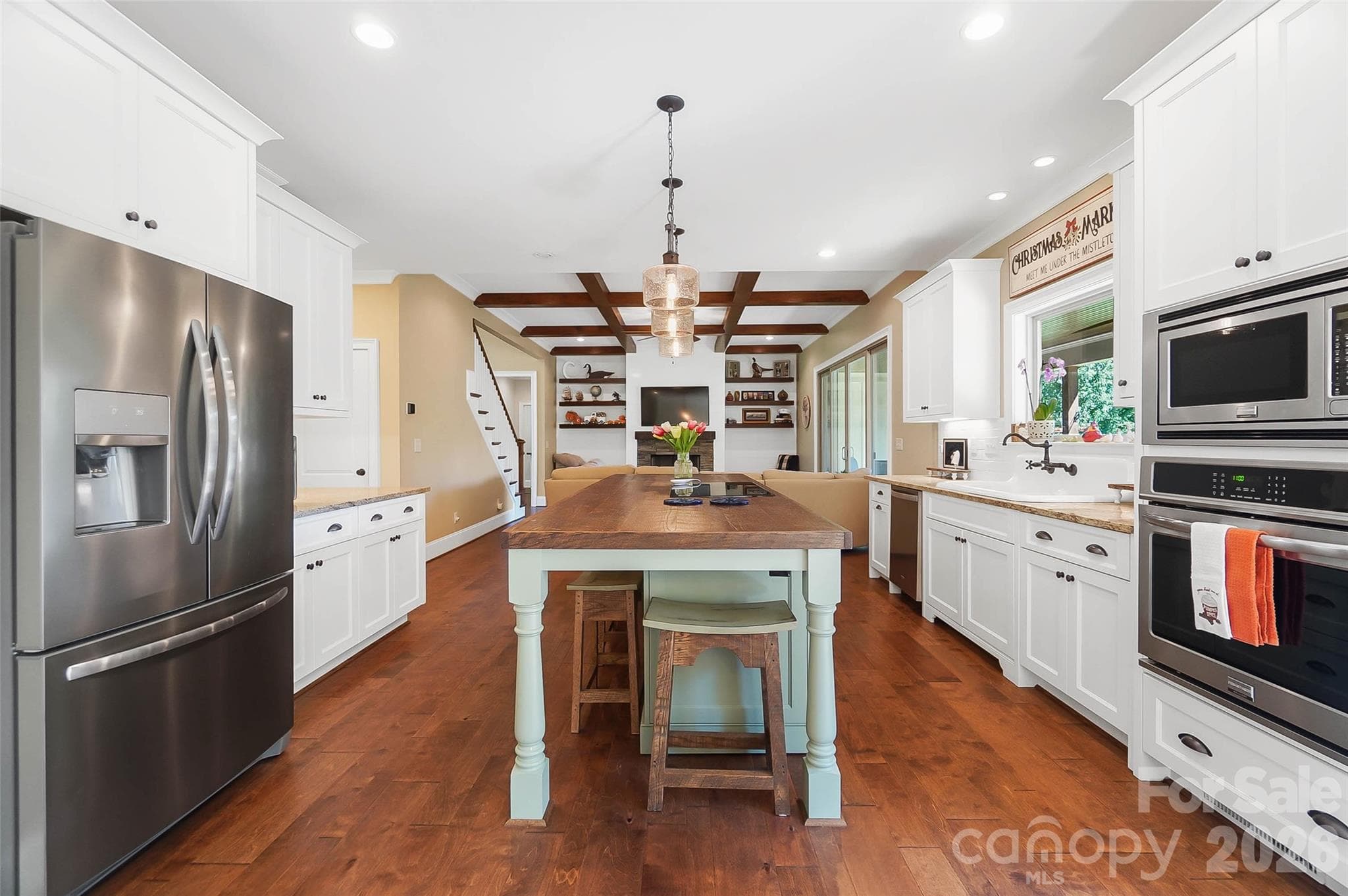 Kitchen showing the refrigerator and island - 3612 Lake Twitty Drive, Monroe