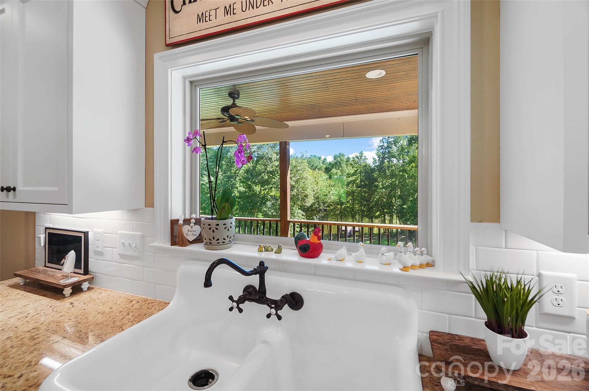 Farmhouse sink overlooking the covered deck - 3612 Lake Twitty Drive, Monroe