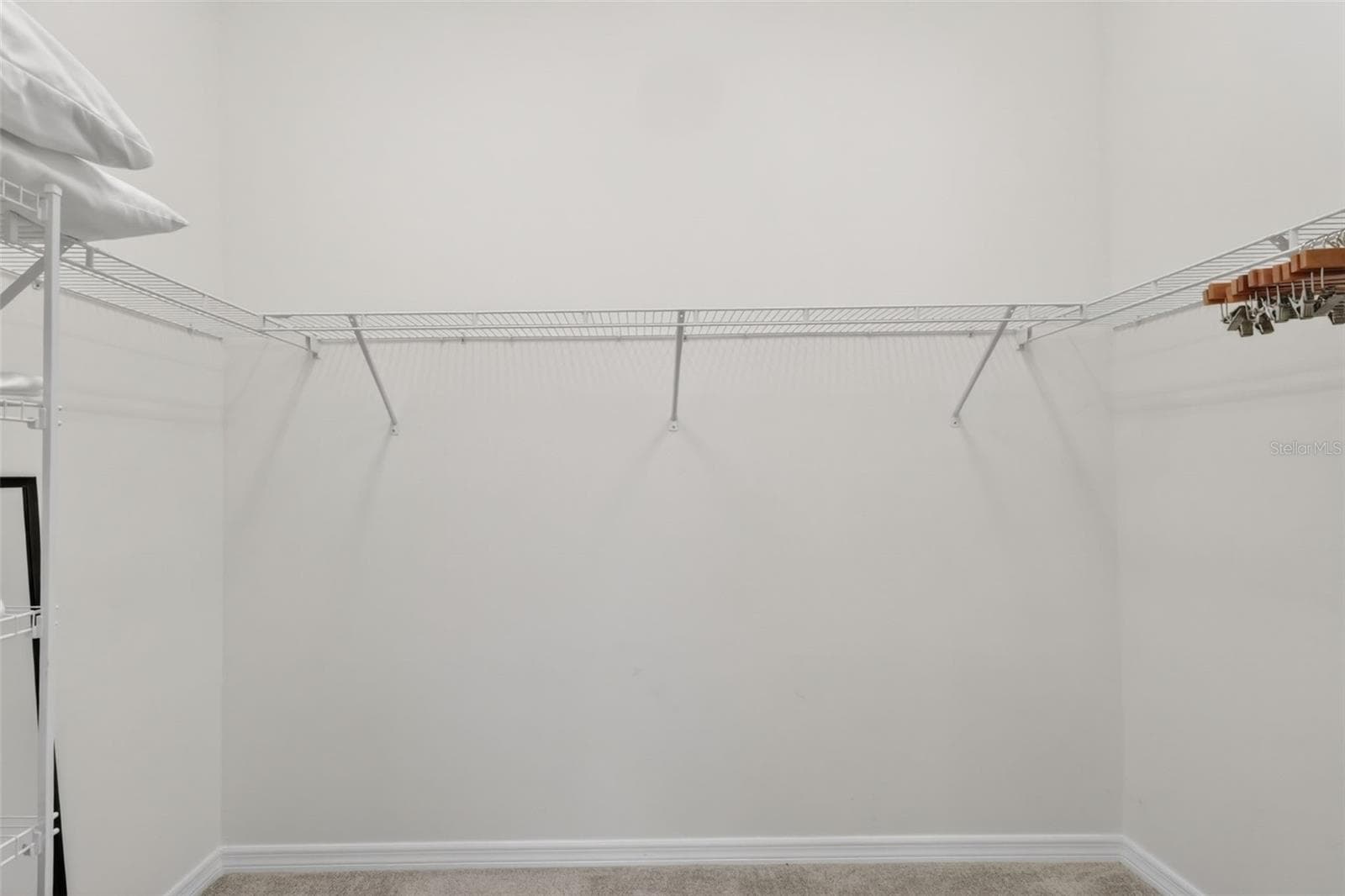 Primary Bedroom Walk-In Closet - 6857 BAYSINGER PATH, THE VILLAGES