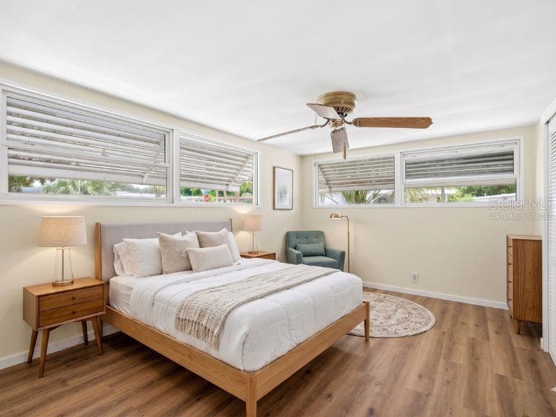 PRIMARY BEDROOMvirtually staged - 14742 MANDARIN ST, TAVARES