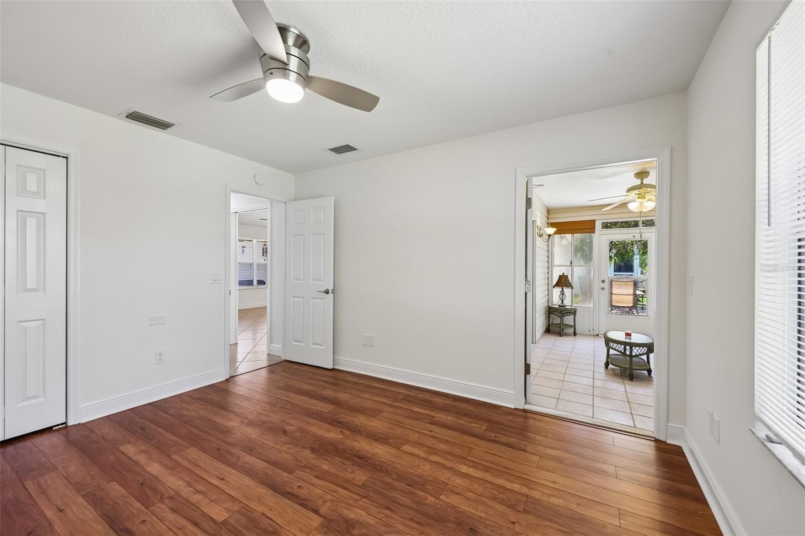 3rd Bedroom with access door to Lanai - 1000 KENOVA AVE, THE VILLAGES
