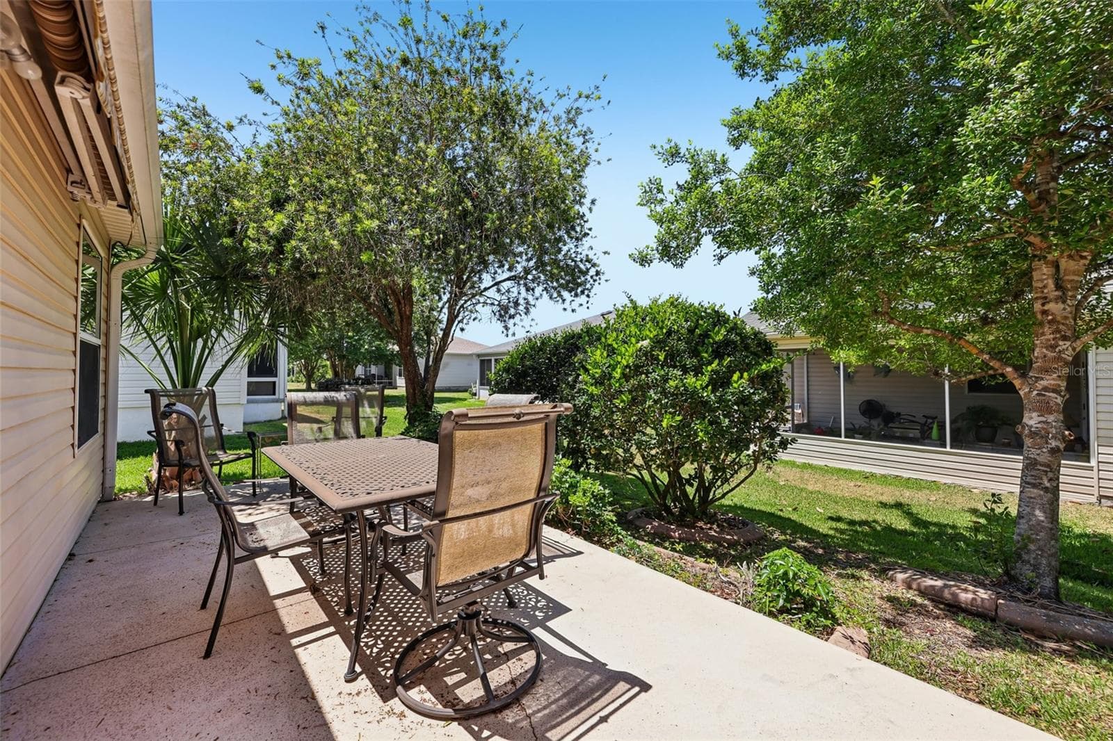 Rear Paver Patio - 1000 KENOVA AVE, THE VILLAGES