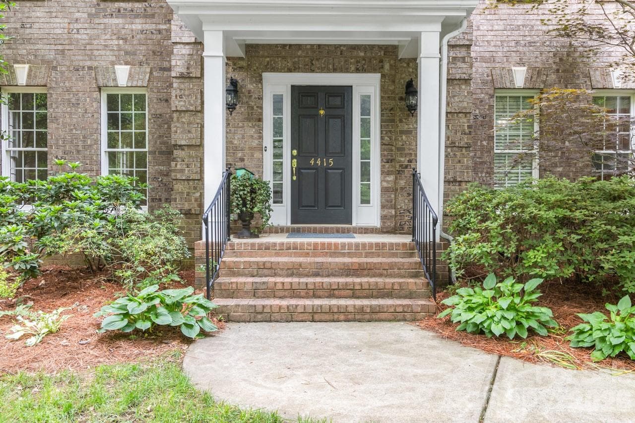 Landscaping leads to front door. - 4415 Everclear Court, Charlotte