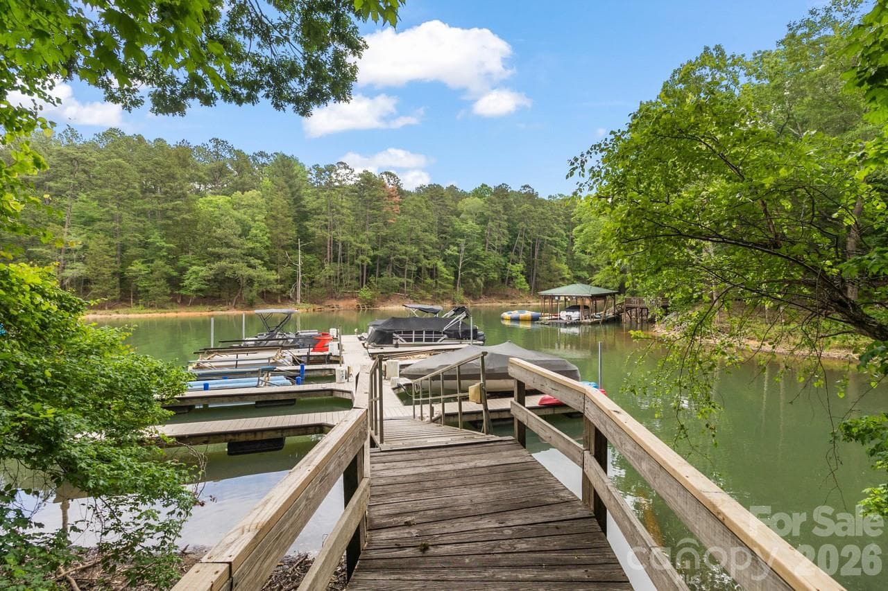 Sellers have slip 15 in Dock G at the intersection of Tranquility and Preservation Point. Boat slip is available for $35,000 to buyer of house. - 4415 Everclear Court, Charlotte