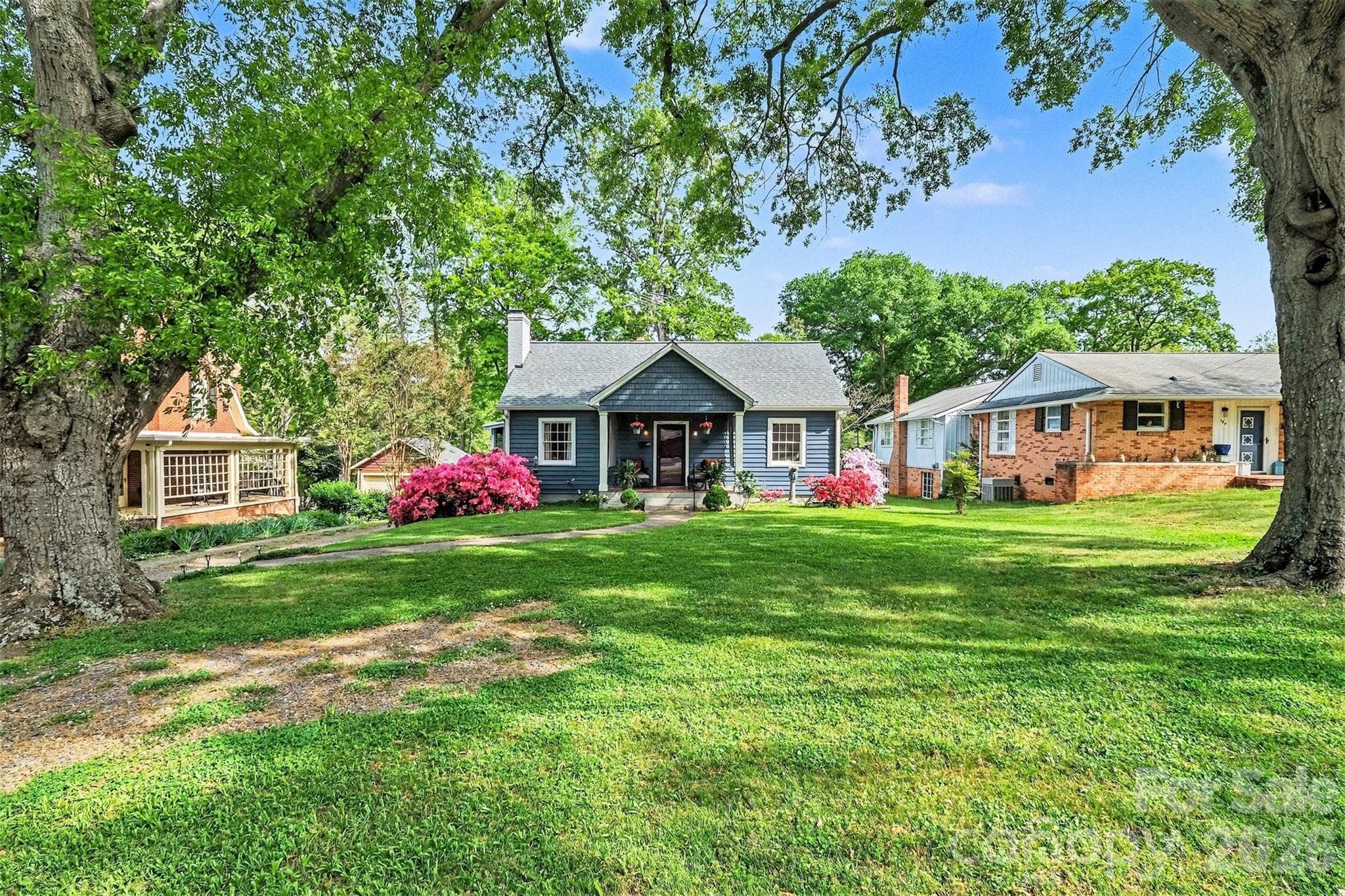 This charming bungalow is located within walking distance to Shelby City Park and Uptown Shelby. - Shelby