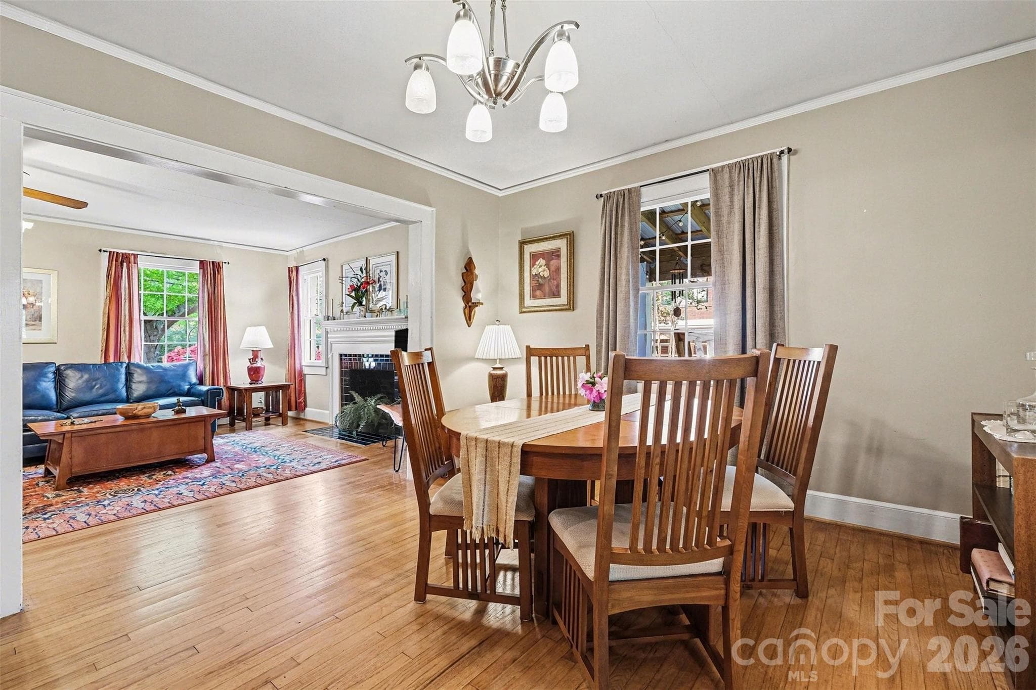The living room is open to the spacious dining room... - Shelby