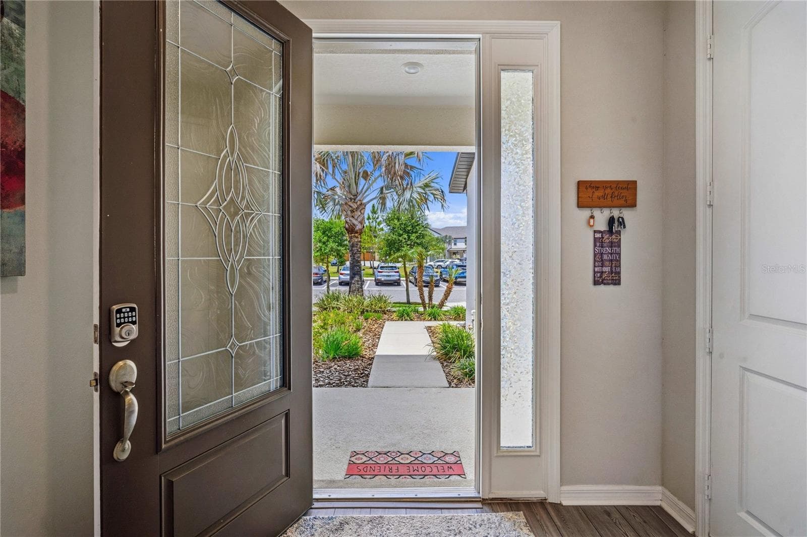 Front door view with tropical palm to welcome you! - 11240 CAY SPRUCE WAY, SAN ANTONIO