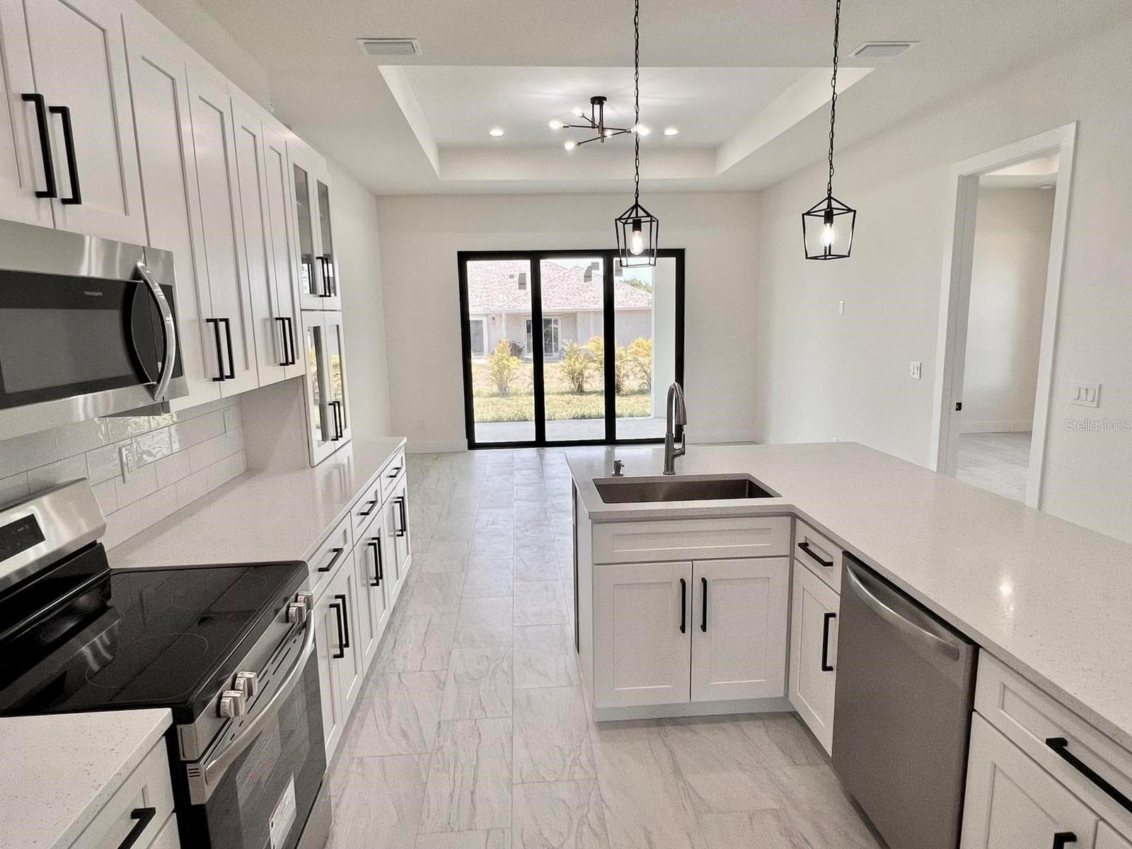 Kitchen from Dinning Room - 9245 BOCA GRANDE AVE, ENGLEWOOD