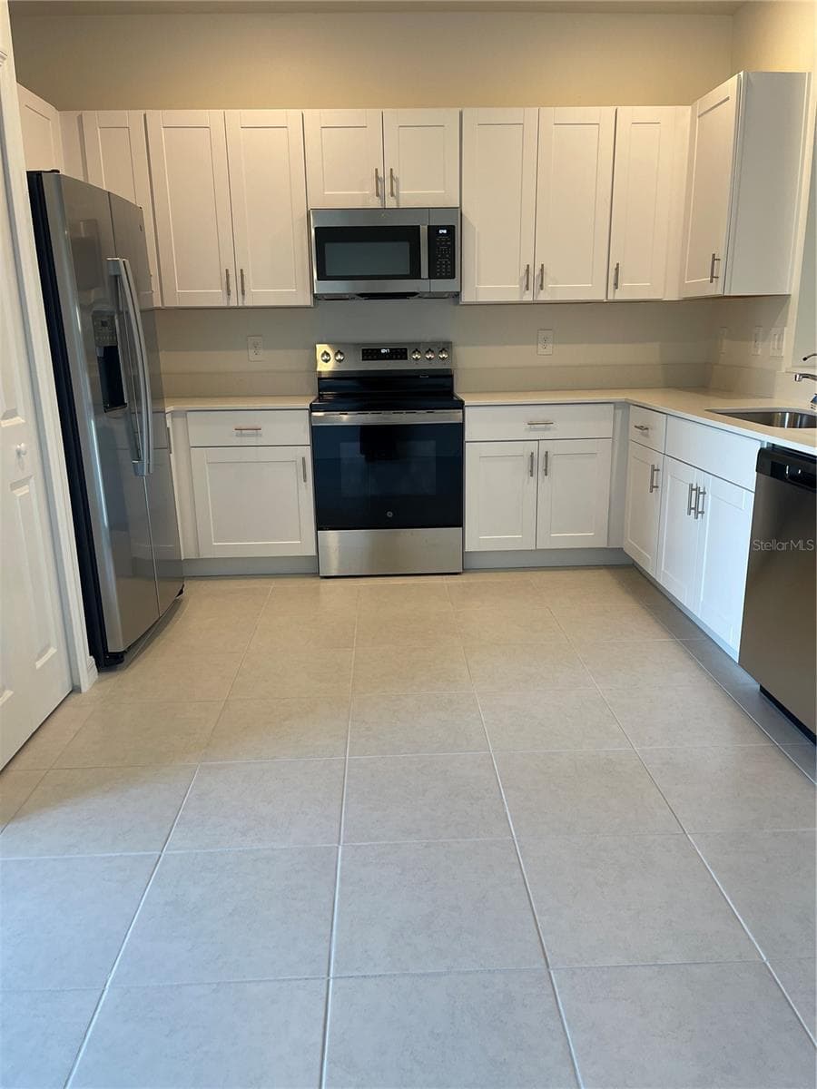 Townhouse at 36217 RISA MICHELE ST, ZEPHYRHILLS, photo 7 of 26