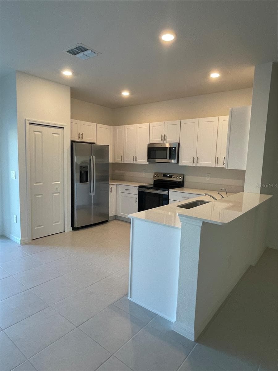 Townhouse at 36217 RISA MICHELE ST, ZEPHYRHILLS, photo 9 of 26