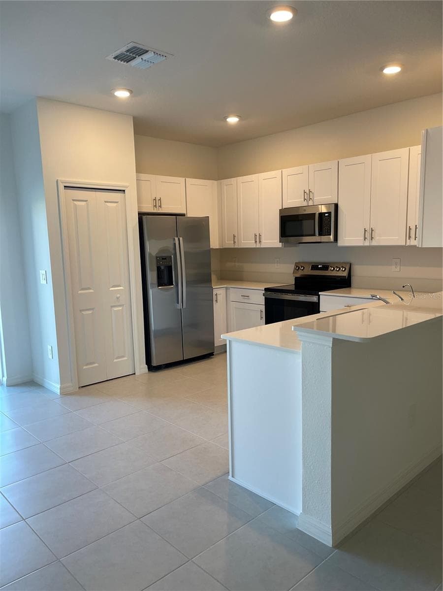Townhouse at 36217 RISA MICHELE ST, ZEPHYRHILLS, photo 10 of 26