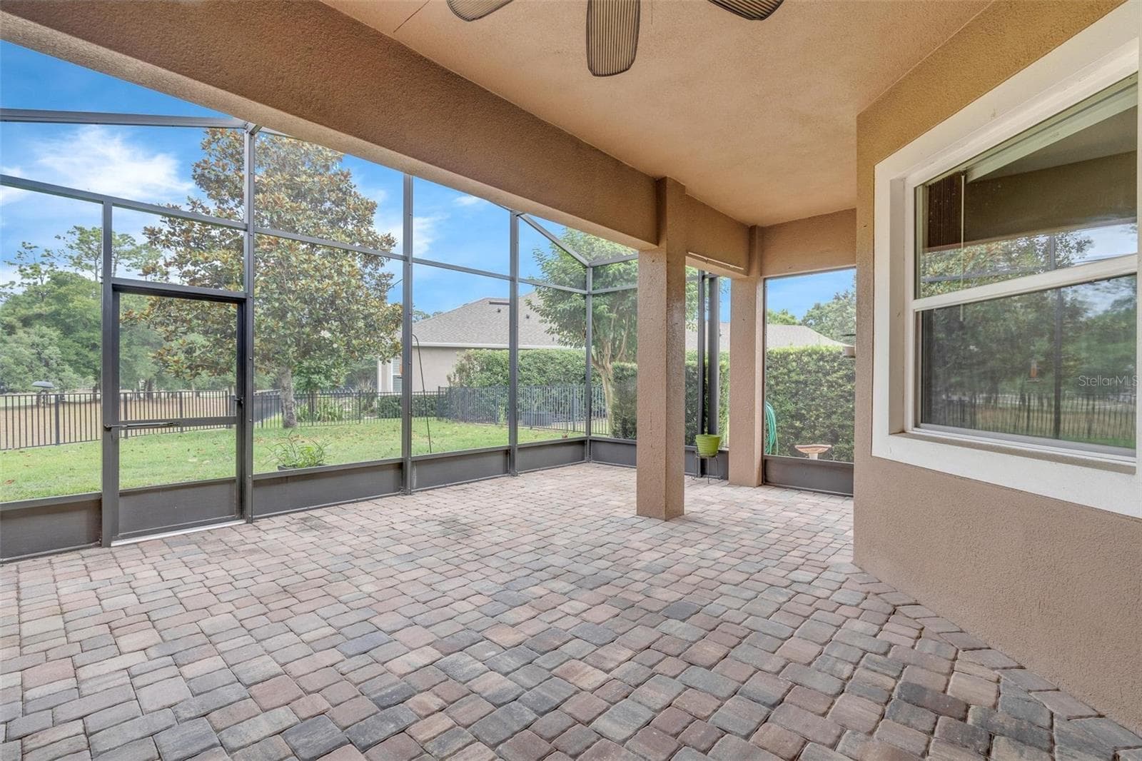 SCREENED PATIO OVERLOOKING GOLF COURSE - 903 VICTORIA HILLS DR S, DELAND