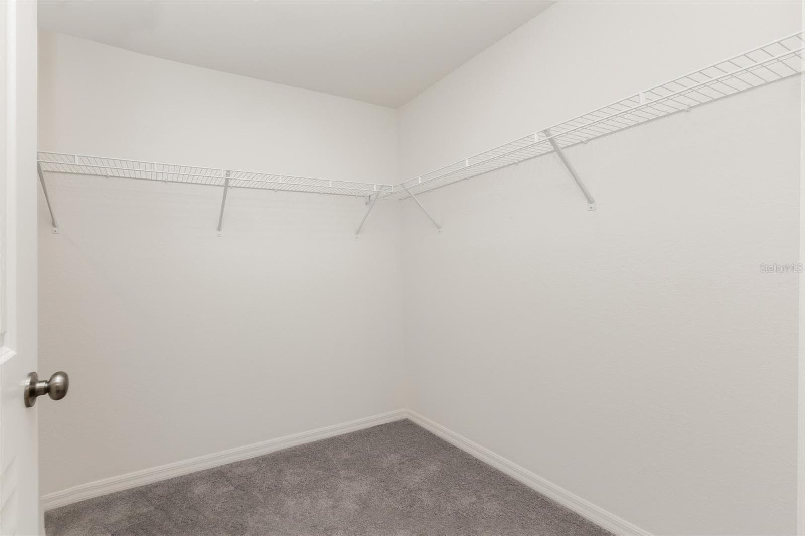 Primary bedroom closet - 1040 SHERWIN ST, PORT CHARLOTTE