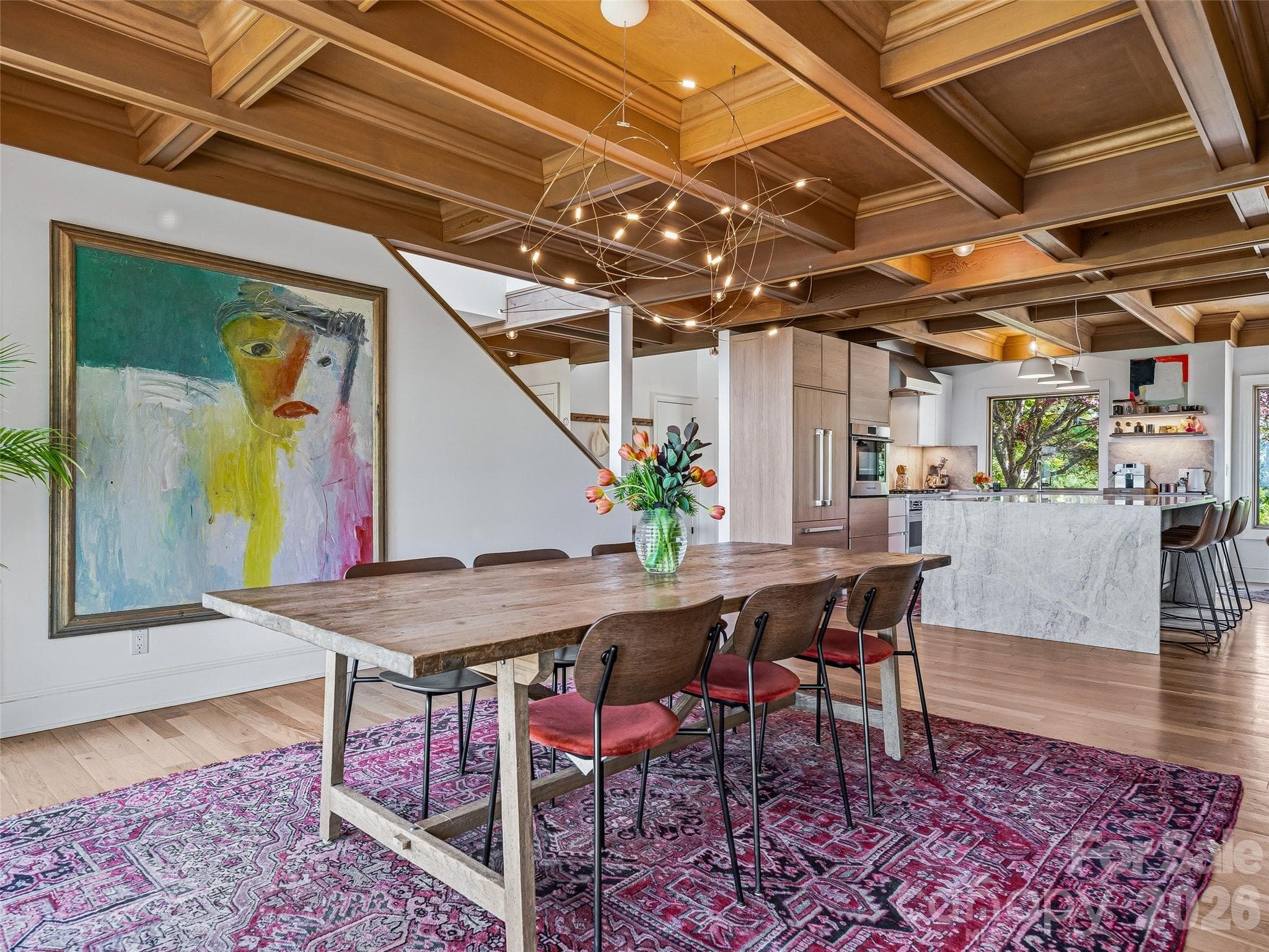 Open concept floor plan makes for a seamless hosting experience. - 100 Big Spring Drive, Asheville