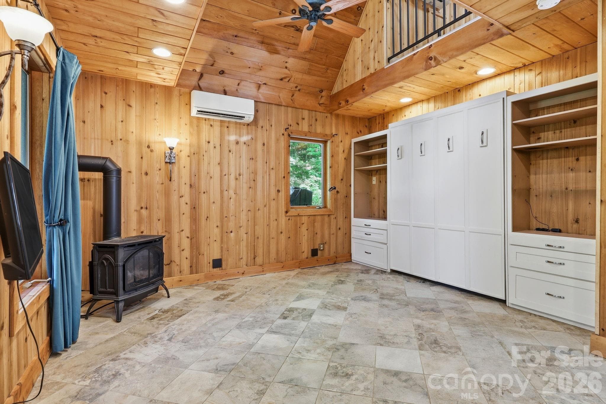 Living Room with Vented Propane Woodstove and Built-Ins - 98 Sparkling Springs Road, Fairview