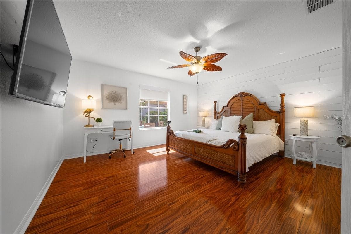 Thoughtfully details, including TV, Desk, & Ceiling Fan - VILLAGES OF SUMTER, THE VILLAGES