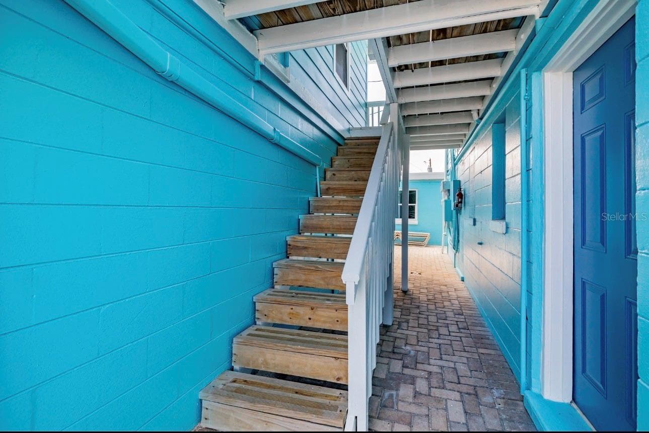 Stairway to Unit 12 - 13343 GULF BLVD #14, MADEIRA BEACH