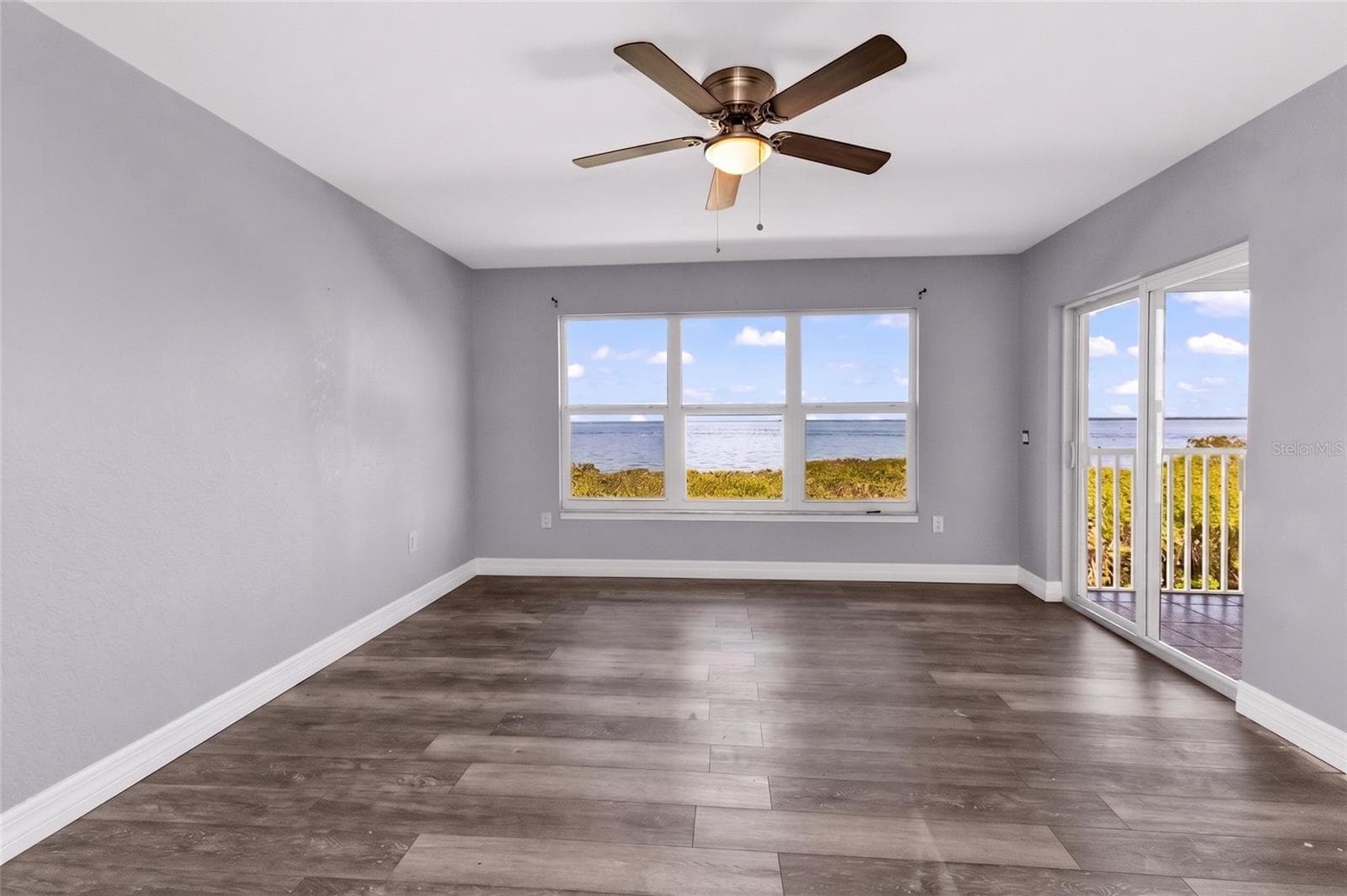 Master bedroom overlooking Charlotte Harbor to the west - 101 N MARION CT #213, PUNTA GORDA