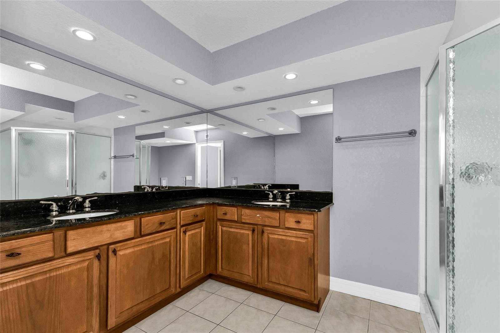 Master bathroom with dual vanities - 101 N MARION CT #213, PUNTA GORDA